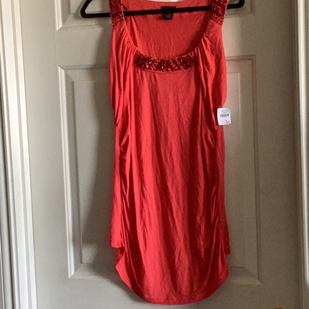 Red Sleeveless Top with Embellished Neckline
